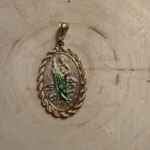 Gold plated religious pendant